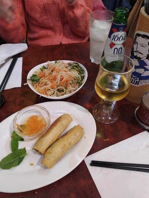 Papaya salad, some rolls (they came as 4, 2 were already eaten when we remembered to take a photo), alcohol free beer and coconut drink at Bodhi Vegan in Paris