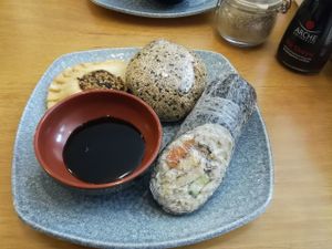 Tofu sushi roll, filled pastry, rice ball at Deshima in Amsterdam