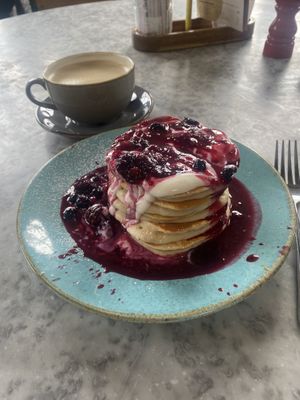 Merry Berry vegan pancakes 🥞 oat milk latte ☕️   at Noa Bake House in Douglas