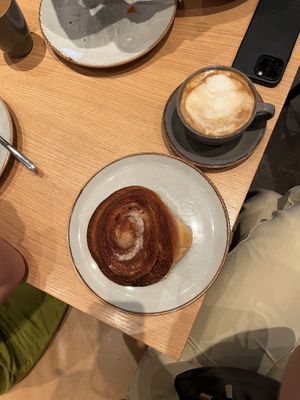 Cinnamon roll & soy latte   at Godt Brød Fløyen in Bergen