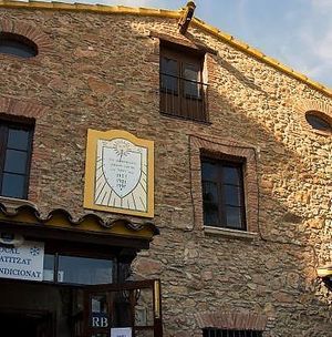 A gorgeous old Catalan farmhouse with the most beautiful terrace for al fresco dining at its best. at Can Sabata in Lloret De Mar