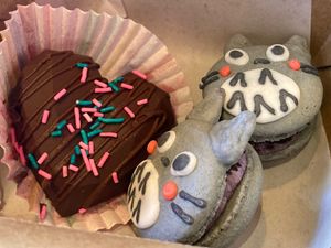 Red velvet cake truffle and two Totoro ube cookies 'n' cream macarons at CyBelle's Front Room in San Francisco