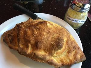 Vegan calzone with garlic parmesan at CyBelle's Front Room in San Francisco