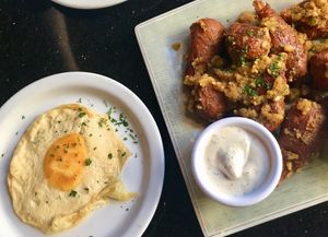 Vegan egg and garlic parm chick’n wings! at CyBelle's Front Room in San Francisco