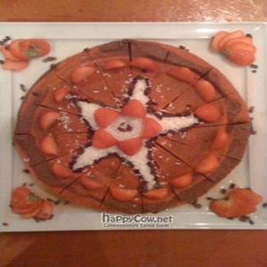 a raw strawberry & chocolate tart... yummmmm! at Golden Temple in Amsterdam