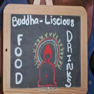 a chalkboard sign at the entrance at Golden Temple in Amsterdam