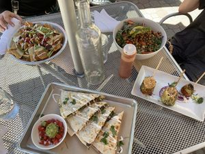 Nachos, quesadilla, elote, and a big salad! at BoltCutter in Salt Lake City