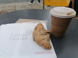 Croissant and coffee at Square Roots in Whitley Bay