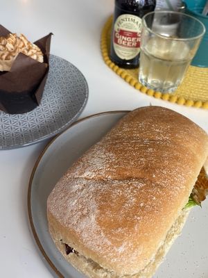 Sausage sarne and biscotti and chocolate muffin yum 🤤   at Square Roots in Whitley Bay