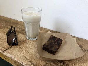 Oat milk smoothie and chocolate brownie  at Square Roots in Whitley Bay