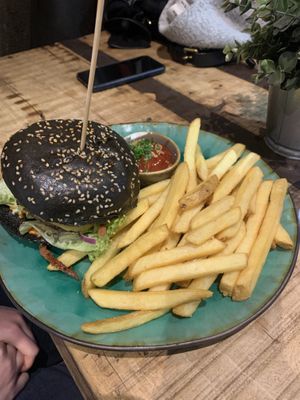 Bacon burger with fries  at Bidges & Sons Reeperbahn in Hamburg