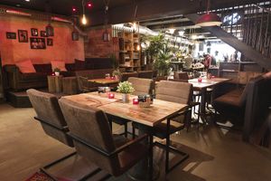 The Lounge/Cafe in the back of the store where you can have coffee, cakes, vegan fast food, cocktails, while you're shopping at Bidges & Sons Reeperbahn in Hamburg