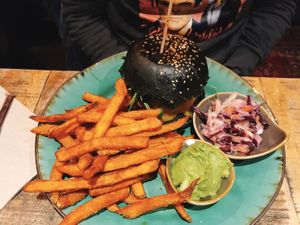 burger with sweet potato fries at Bidges & Sons Reeperbahn in Hamburg