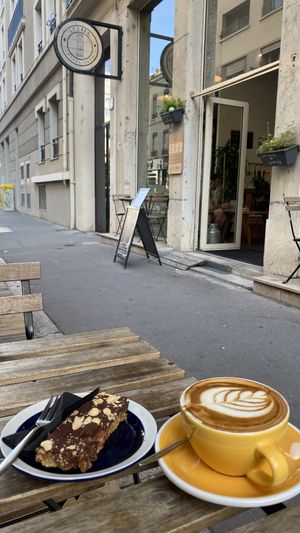 chocolate cake peanuts and caramel and cappuccino with oat milk  at Le Labo in Lyon