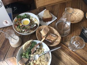 buddha bowl spread w/ bread  at Le Labo in Lyon