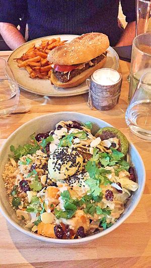 Crispy burger, sweet potatoes fries and bouddha bowl at Oh My Greens in Montpellier