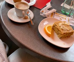 Vegan carrot cake and cappuccino with oat milk   at Astarix in Trier