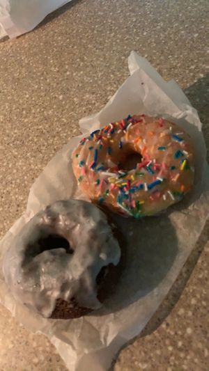 Chocolate w. Vanilla Glaze & A Classic - Vanilla w. Sprinkles ✨  at Dottie's Donuts - Queen Village in Philadelphia
