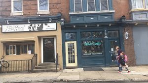 Go to this one next to Blackbird Pizzeria and get pizza too at Dottie's Donuts - Queen Village in Philadelphia