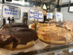 Boston cream and birthday buttercream  at Dottie's Donuts - Queen Village in Philadelphia