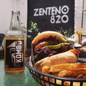 satánica [seitan burger] with avocado, onion rings, real fries and a very good kombucha! at Vg Burger in Santiago