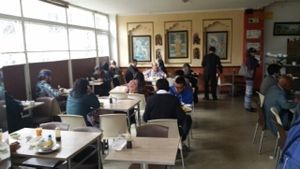 inside restuarant. mostly locals and a few of us gringos  at Loto Azul Vegetariano in Bogota