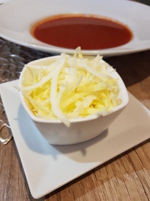 Tomato soup with vegan cheese at Pizza Boss & Boss Burger in Bratislava