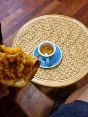 Spicy veg pulled beef jaffle and espresso at Union Kiosk in Melbourne