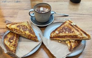 Tofu scramble jaffle, pepperoni mac n cheese jaffle, almond milk mocha with vegan marshmallows   at Union Kiosk in Melbourne