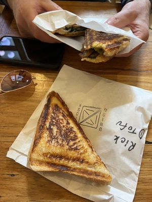 Mushroom, mozzarella, & spinach and tofu scramble jaffles   at Union Kiosk in Melbourne
