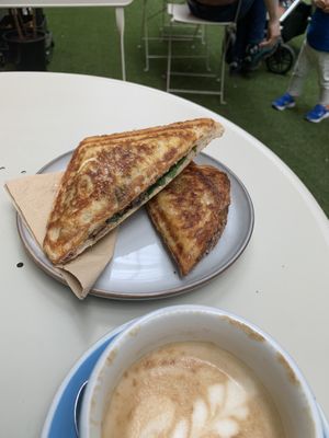 Mushroom and spinach toastie minus basil. Still had a herb that I wasn’t a fan of, but tasty all the same    at Union Kiosk in Melbourne