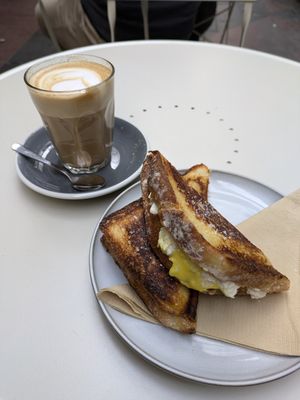 Tofu scramble jaffle with almond milk latte at Union Kiosk in Melbourne