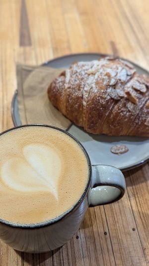 Flat white + almond croissant at Union Kiosk in Melbourne