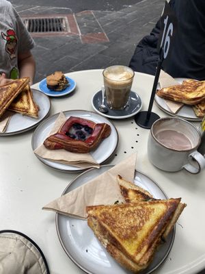 3 different flavours of jaffles, a soy latte, soy hot chocolate, a cookie, & blueberry danishh  at Union Kiosk in Melbourne
