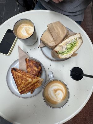 the chicken mayo sandwich and the harissa chicken toastie with 2 lattes   at Union Kiosk in Melbourne