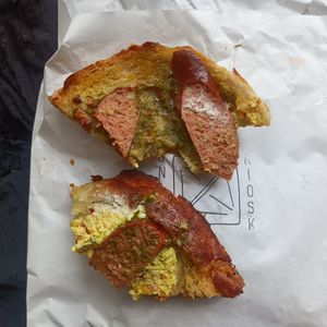 Tofu scramble, feta, sausage, pesto at Union Kiosk in Melbourne