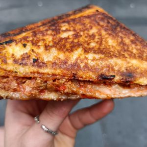 bolognese, mozzarella, garlic butter jaffle at Union Kiosk in Melbourne