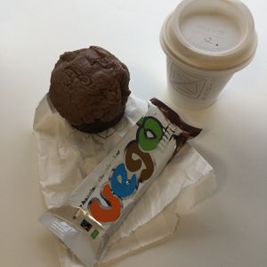 Vego spread top cupcake, vego bar and decaf oat milk cappuccino  at Union Kiosk in Melbourne