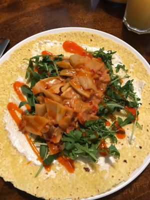 Delicious and filling Pulled Jackfruit wrap with coconut cream and chilli sauce. at The Hidden City Cafe in Londonderry