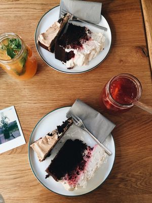 Homemade Ice Teas, Dark Coffee Chocolate cake with raspberries and Chai topping and Sweet Potato Oreo Brownie with Nougat Topping ♥️ at Sturbock Cafe in Wurzburg