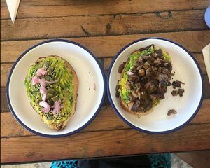 Two bits of ago on toast, the right one with mushrooms ok top  at The Factory Cafe in Koh Tao
