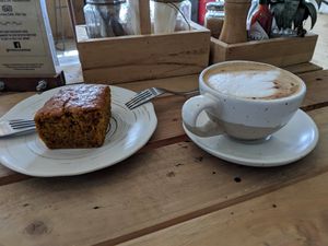 Vegan 🥕 cake and cappuccino with soy milk. at The Factory Cafe in Koh Tao