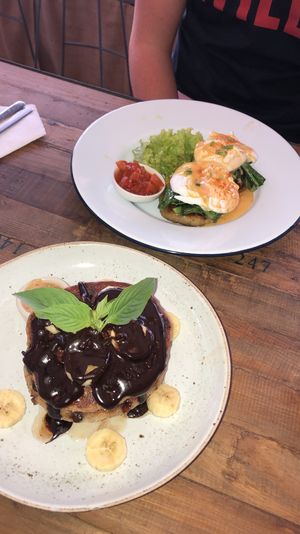 Choc chip pancakes & eggs benedict  at The Factory Cafe in Koh Tao