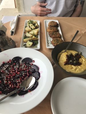 Potatoes, zucchini balls, beetroot salad, fava at Melina's Tavern in Santorini