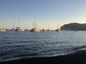 The view of the ocean at sunset at Melina's Tavern in Santorini