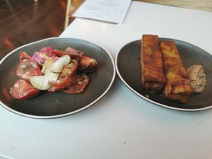 Iberiko tomatoes, shio koji, radish/1000 layer potatoes, caramelised shiitake ketchup. at The Omni Collective in South East London