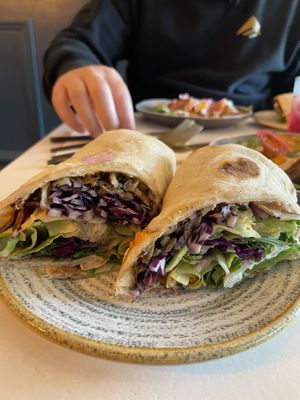 Oyster mushroom Shawarma wrap and tahini butternut squash, rocket salad   at The Omni Collective in South East London
