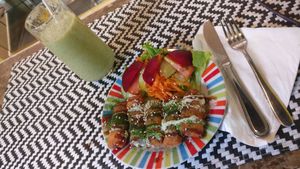 Green smoothie and spring rolls. at Coraçao Vegano in Funchal