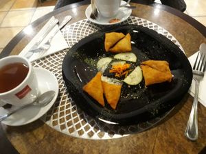 Samosas and Puka tea. at Coraçao Vegano in Funchal