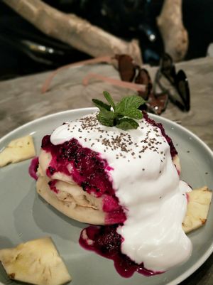 Amazing fluffy pancakes with coconut cream and dragon fruit. A must! at Kekinian in Penida Island